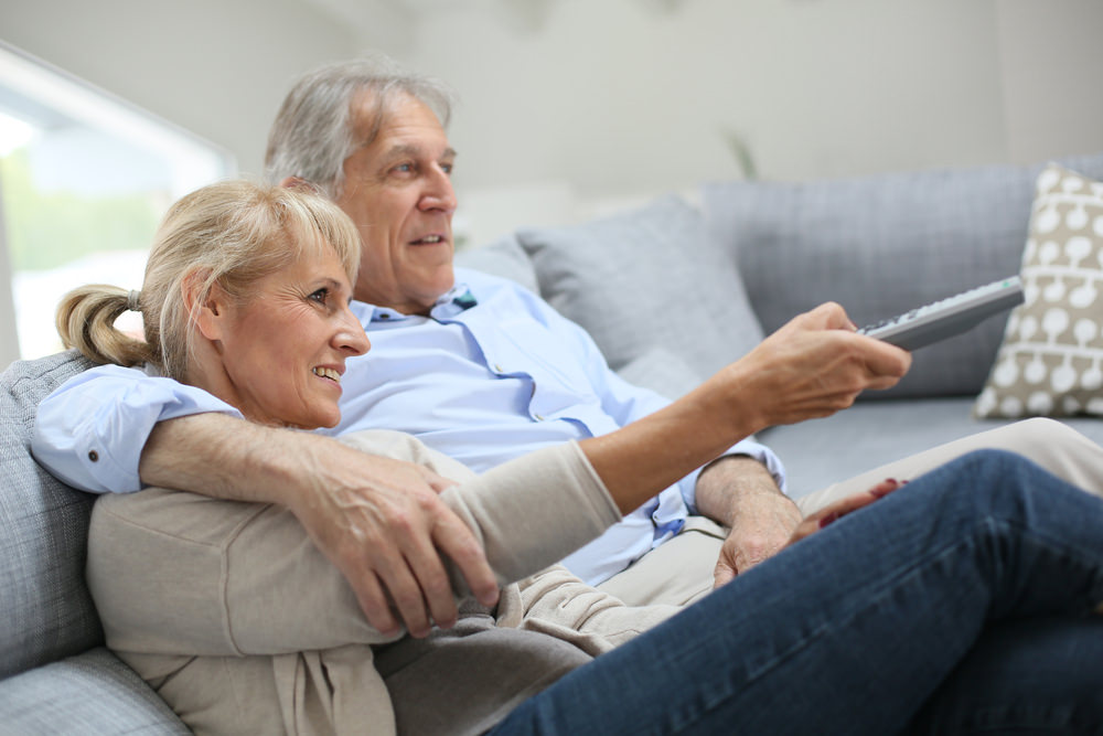 couple watching television together